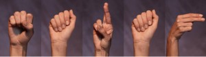 Sarah's name finger-spelled in ASL