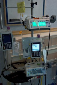 The machine in the upper right hand corner slowly squeezes the syringe to feed Julie gradually.