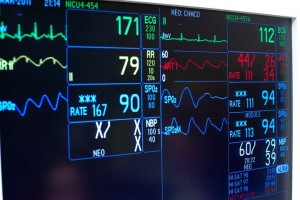The large LED monitor over Julie's baby box shows all the vital signs