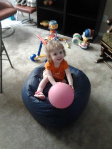 Playing on beanbag chair