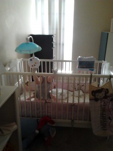 She loves doing headstands in the crib