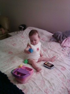 Julie sitting up at 9 months