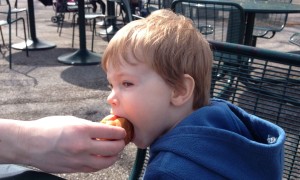 Adam eating 1st real hotdog